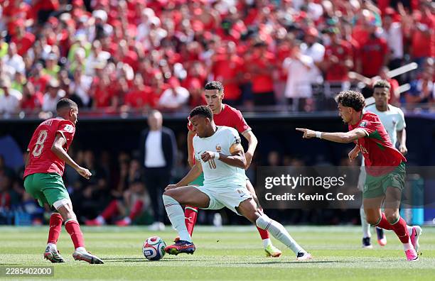 Kylian Mbappe of France controls the ball against Azzedine Ounahi, Bilal El Khannouss and Neil El Aynaoui of Morocco during the FIFA World Cup 2026...