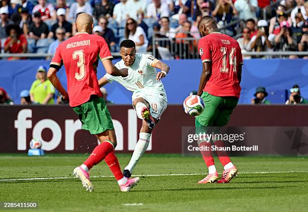 Kylian Mbappe of France scores his team's first goal during the FIFA World Cup 2026 Quarter Final match between France and Morocco at Boston Stadium...
