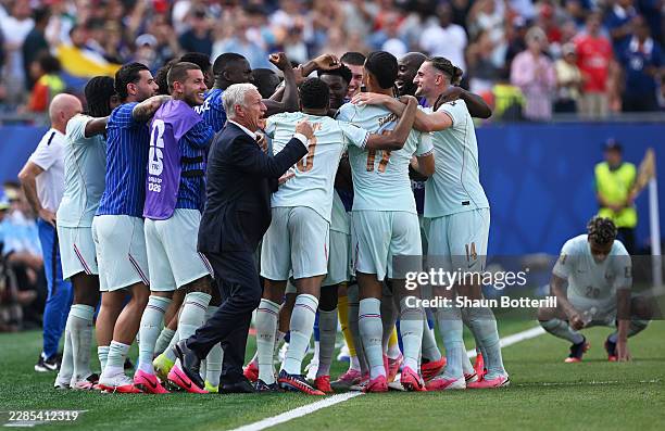 Didier Deschamps, Head Coach of France, and players of France celebrate the team's second goal scored by Ousmane Dembele during the FIFA World Cup...