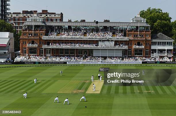 Lauren Bell of England bowls the first ball of the 1st Women's Rothesay Test Match between England and India at Lord's Cricket Ground on July 10,...