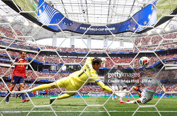 Fabian Ruiz of Spain scores his team’s first goal past Thibaut Courtois of Belgium during the FIFA World Cup 2026 Quarter Final match between Spain...