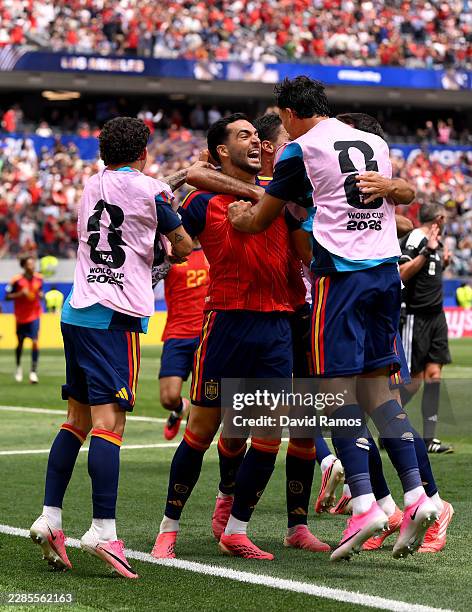 Mikel Merino of Spain celebrates with teammates after scoring the team's second goal during the FIFA World Cup 2026 Quarter Final match between Spain...