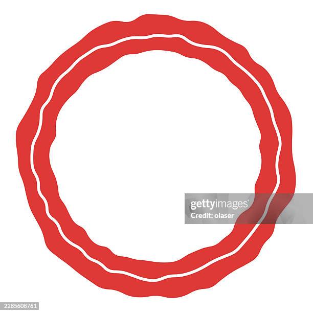 a red circular seal outline with a white center sits on a plain white background, featuring a wavy outer edge and a thinner inner ring. - round table stock illustrations