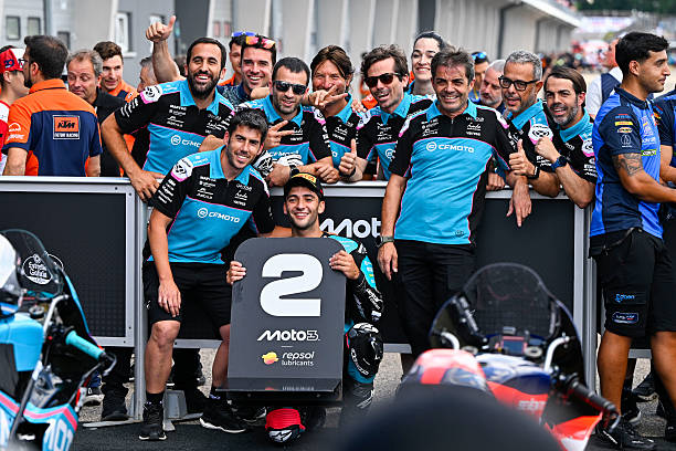 Second placed qualifier Marco Morelli of Argentina riding the CFMOTO Gaviota Aspar Moto3 bike celebrates in parc ferme during Moto3 qualifying at...
