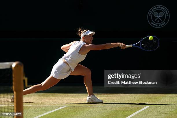 Linda Noskova of Czechia plays a backhand against Karolina Muchova of Czechia during their Ladies' Singles final match on day thirteen of The...