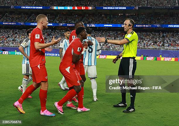 Breel Embolo of Switzerland argues with referee Joao Pinheiro following his second yellow card and subsequent red card during the FIFA World Cup 2026...