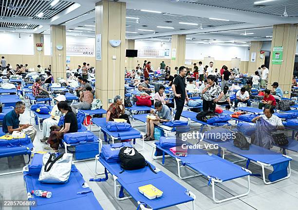 Villagers are evacuated to a primary school as Typhoon Bavi approaches on July 11, 2026 in Hangzhou, Zhejiang Province of China. Typhoon Bavi, the...