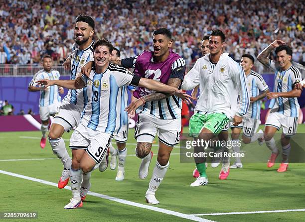 Julian Alvarez of Argentina celebrates with teammates after scoring his team's second goal during the FIFA World Cup 2026 Quarter Final match between...