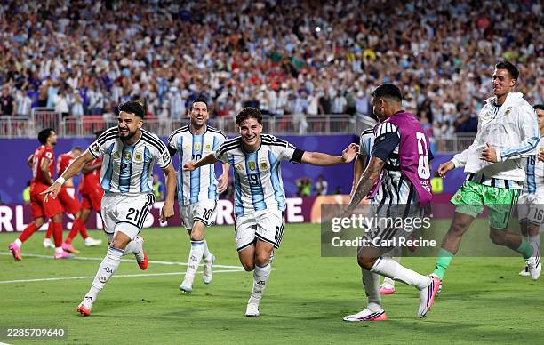 Julian Alvarez of Argentina celebrates with teammates after scoring his team's second goal during the FIFA World Cup 2026 Quarter Final match between...