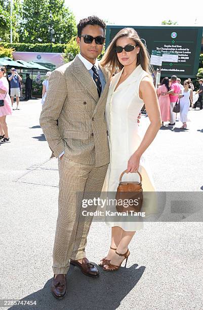 Jaafar Jackson, wearing Ralph Lauren, and Maddie Simpson attend day fourteen of the 2026 Wimbledon Tennis Championships at the All England Lawn...
