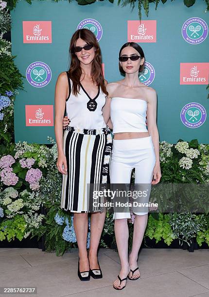 Daisy Edgar-Jones and Lily Collins attend as guests of Emirates, Official Airline Partner of 2026 Wimbledon Championships, at the All England Lawn...