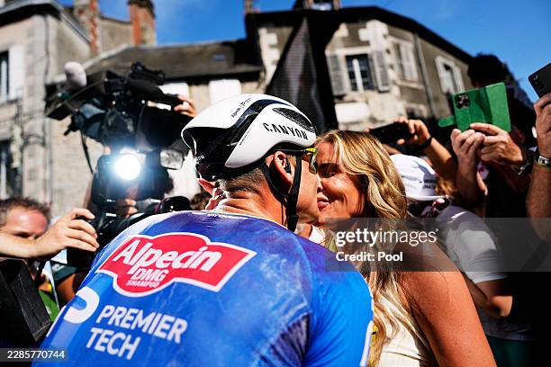 Stage winner Mathieu van der Poel of Netherlands and Team Alpecin-Premier Tech celebrates with his mate Roxanne Bertels of Belgium after the 113th...