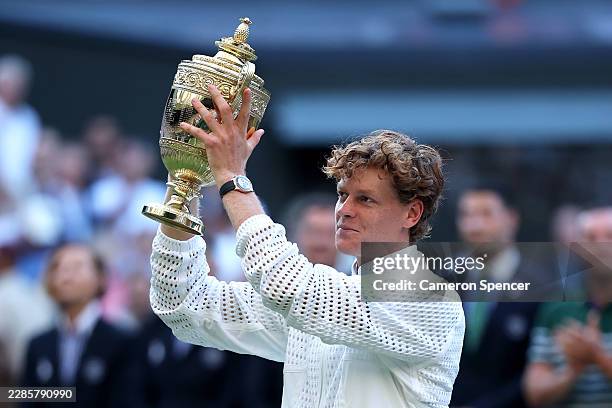 Jannik Sinner of Italy poses for a photo with The Gentlemen's Singles Trophy after victory against Alexander Zverev of Germany in the Gentlemen's...
