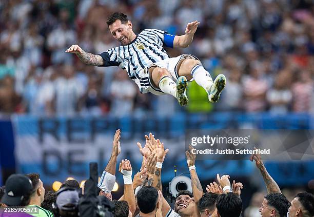 Lionel Messi of Argentina is thrown in the air by teammates after the 3-2 victory during the FIFA World Cup 2026 Round of 16 match between Argentina...
