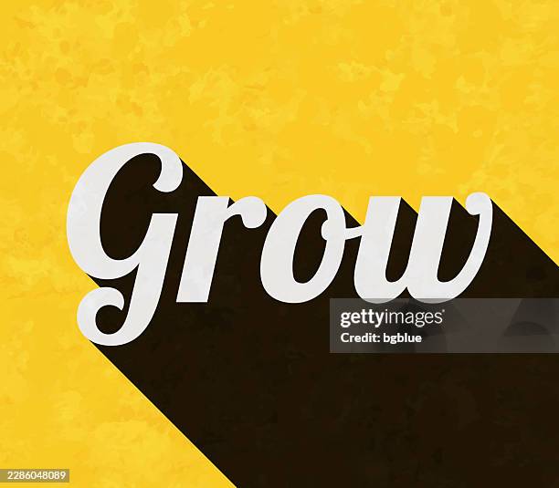grow - text with long shadow on textured yellow background - wild poster texture stock illustrations