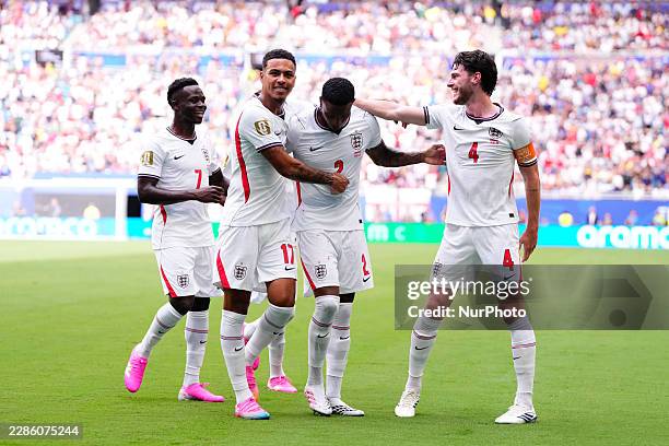 Ezri Konsa of England celebrates after scoring his team's second goal with teammates during the FIFA World Cup 2026 Bronze Medal Match match between...