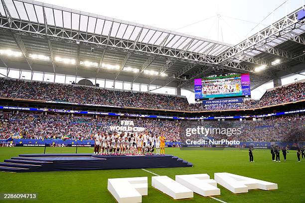 Players of England pose for the photo after receiving their third place medals during the FIFA World Cup 2026 Bronze Medal Match match between France...