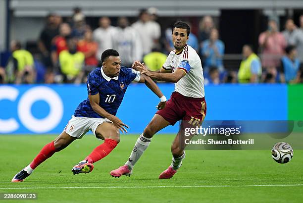 Kylian Mbappe of France competes for the ball against Rodri of Spain during the FIFA World Cup 2026 Semi Final match between France and Spain at...