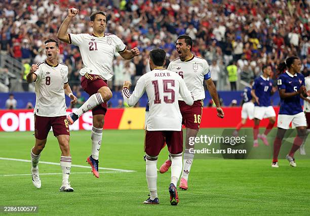 Mikel Oyarzabal of Spain celebrates with teammates after converting a penalty to score the team's first goal during the FIFA World Cup 2026 Semi...