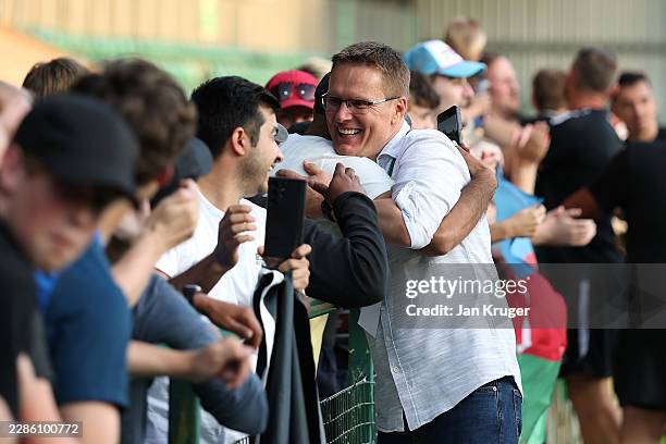 Sabah FK manager Valdas Dambrauskas embraces supporters following the UEFA Champions League 2026/27 First Qualifying Round second leg match between...