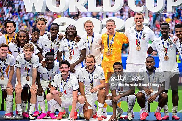 England players receive their third place medals and pose after the FIFA World Cup 2026 Bronze Final between France and England at Miami Stadium on...