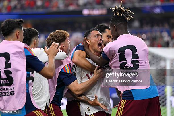 Pedro Porro of Spain celebrates with teammates after scoring the team's second goal during the FIFA World Cup 2026 Semi Final match between France...