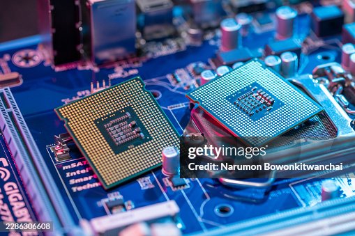 Computer microchip CPU installed in motherboard socket. Computer microchip CPU installed in motherboard socket.