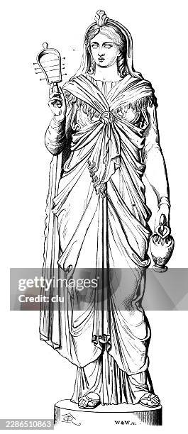 statue of isis in the capitoline museum — the egyptian goddess stands in a long, richly draped robe and holds a sistrum and a small vessel - cult stock illustrations