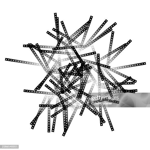 a chaotic arrangement of film strips forming a dynamic visual pattern. - complicated math stock illustrations