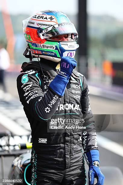 Pole position qualifier Andrea Kimi Antonelli of Italy and Mercedes AMG Petronas F1 Team celebrates on arrival in parc ferme during qualifying ahead...
