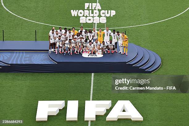 England players pose for a photograph after receiving their third place medals after their 6-4 win during the FIFA World Cup 2026 Bronze Final...