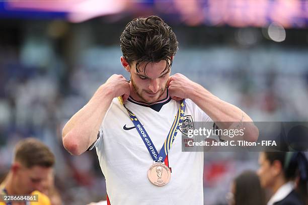 Declan Rice of England reacts after receiving the third place medal following the FIFA World Cup 2026 Bronze Final between France and England at...
