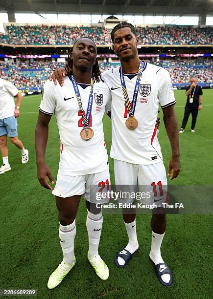 Eberechi Eze and Marcus Rashford of England pose for a photograph with their bronze medals after the team's victory in the FIFA World Cup 2026 Bronze...