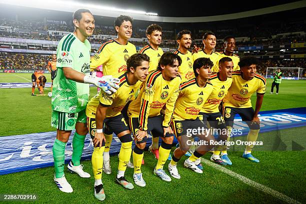 Players of America pose for a team photo during the 1st round match between Queretaro and America as part of the Torneo Apertura 2026 Liga MX at La...