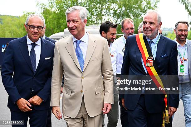 King Philippe of Belgium with Stefano Domenicali, CEO of the Formula One Group in the Paddock during the F1 Grand Prix of Belgium at Circuit de...