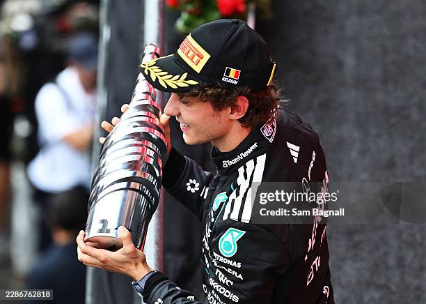 Race winner Andrea Kimi Antonelli of Italy and Mercedes AMG Petronas F1 Team on the podium with his trophy during the F1 Grand Prix of Belgium at...