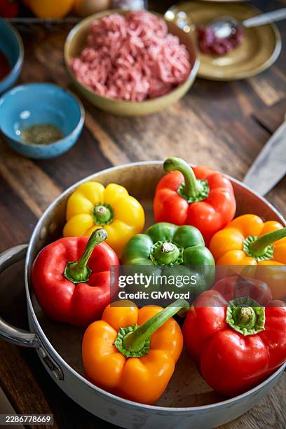 colorful bell peppers in a metal pan - bell pepper stock pictures, royalty-free photos & images