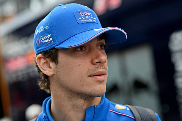 Alpine's Argentinian driver Franco Colapinto walks in the paddock prior the first practice session at the Hungaroring racetrack in Mogyorod near...