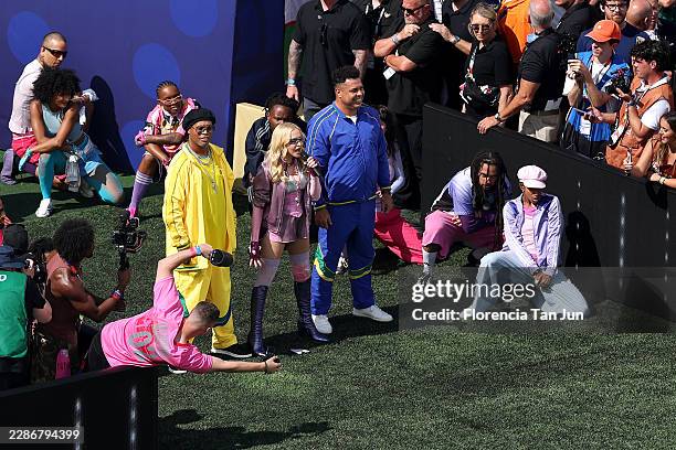 Ronaldinho, Madonna and Ronaldo perform during the Topps Final Halftime Show in the FIFA World Cup 2026 Final match between Spain and Argentina at...