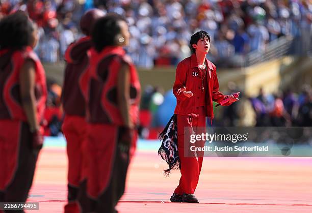 Jin of BTS performs during the Topps Final Halftime Show in the FIFA World Cup 2026 Final match between Spain and Argentina at New York New Jersey...