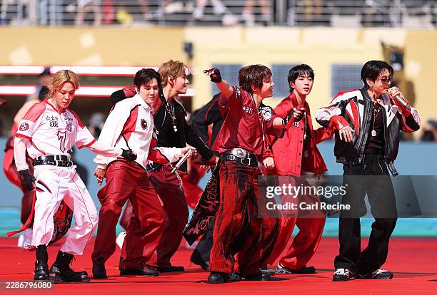 Jin, Suga, J-Hope, Jimin, V and Jung Kook of BTS perform during the Topps Final Halftime Show in the FIFA World Cup 2026 Final match between Spain...