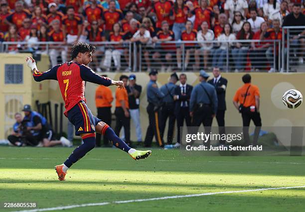 Ferran Torres of Spain scores his team's first goal during the FIFA World Cup 2026 Final match between Spain and Argentina at New York New Jersey...