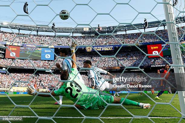 Ferran Torres of Spain scores his team's first goal past Emiliano Martinez of Argentina during the FIFA World Cup 2026 Final match between Spain and...