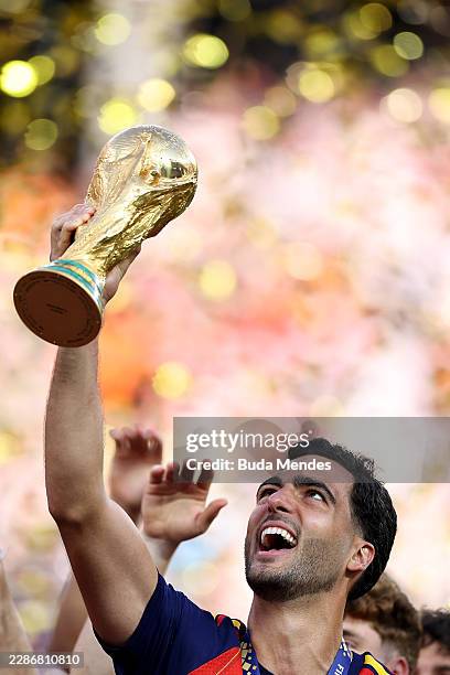 Mikel Merino of Spain lifts the FIFA World Cup Winner’s Trophy after the team’s victory following the FIFA World Cup 2026 Final match between Spain...