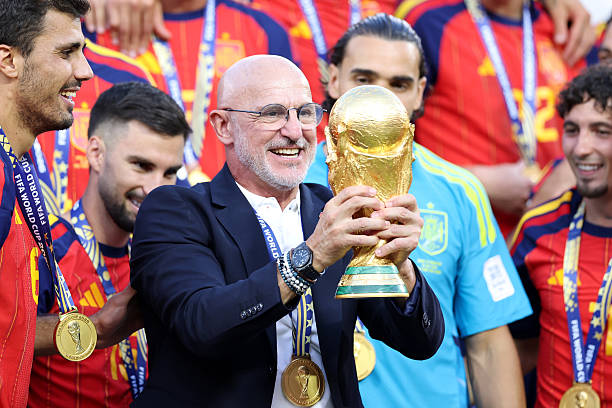 Luis de la Fuente, Head Coach of Spain, lifts the FIFA World Cup Winner’s Trophy after the team’s victory following the FIFA World Cup 2026 Final...