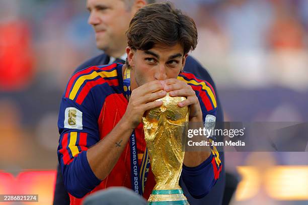 Ferran Torres of Spain kisses the Champions' trophy during the FIFA World Cup 2026 Final match between Spain and Argentina at New York New Jersey...