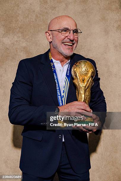 Luis de la Fuente, Head Coach of Spain, poses for a portrait with the FIFA World Cup Winner's Trophy after the FIFA World Cup 2026 Final match...