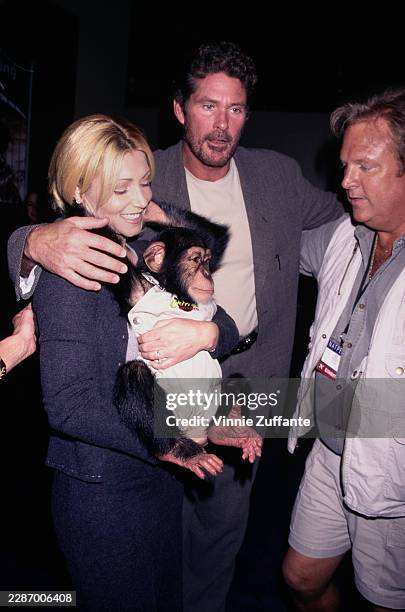 American actor David Hasselhoff with wife Pamela Bach and Rolly the chimpanzee at the NATPE convention in New Orleans, Louisiana, January 27th 1999.
