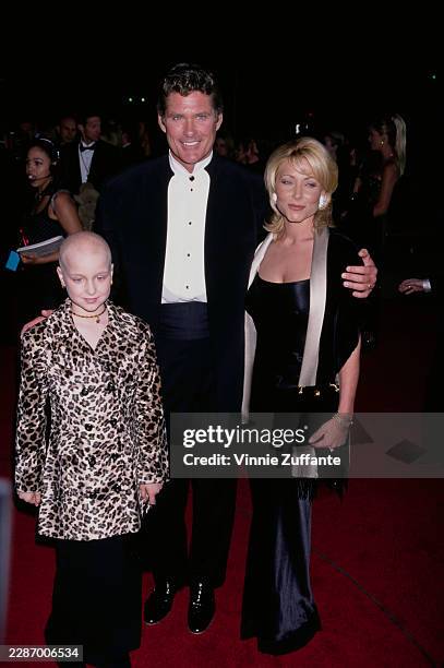 American actor David Hasselhoff with wife Pamela Bach and 11-year-old leukaemia patient Kaylin arrive for the People's Choice Awards at the Pasadena...
