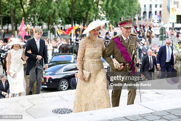 Queen Mathilde of Belgium and King Philippe of Belgium arrive for the Te Deum as they attend the Belgium's National Day ceremony on July 21, 2026 in...